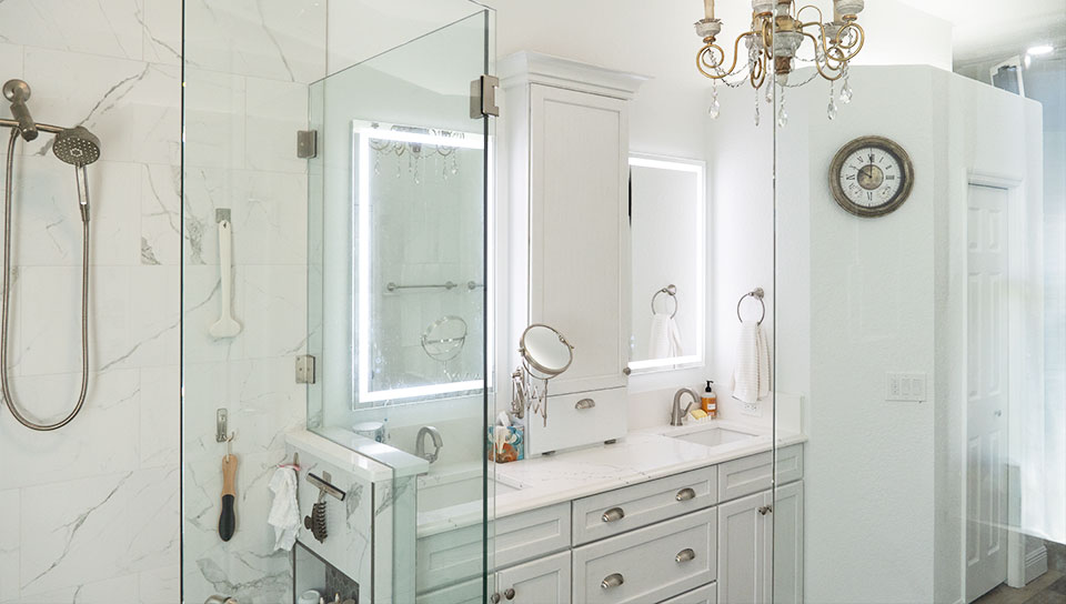 anm-contracting-projects-luxurious-all-white-bathrooms-with-silver-accent-fixtures